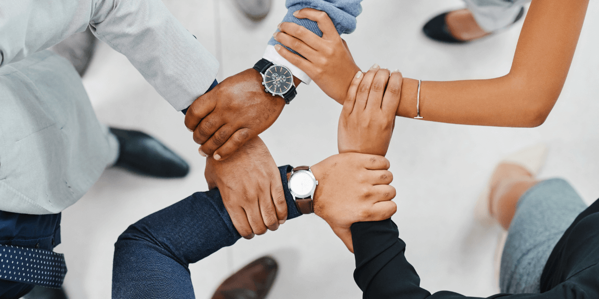 People holding arms